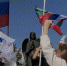 День воссоединения новых регионов с РФ в Волгограде отметили флешмобом у Ангела-хранителя - ИА Высота 102.0