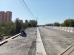 На путепроводе по ул. Рабоче-Крестьянской уложен первый слой нового асфальтового покрытия